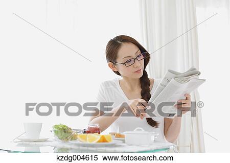 Young attractive Japanese woman having breakfast at home View Large Photo Image Stock Photography - Young attractive Japanese woman having breakfast at home. Fotosearch