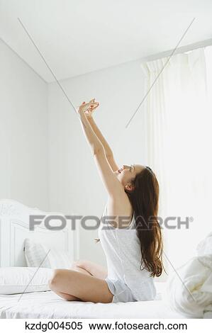 Young attractive Japanese woman in bed View Large Photo Image Stock Photography - Young attractive Japanese woman in bed. Fotosearch
