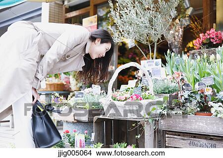 Young attractive Japanese woman downtown Tokyo View Large Photo Image Picture - Young attractive Japanese woman downtown Tokyo. Fotosearch