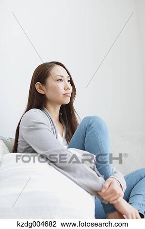 Stock Image - Young attractive Japanese woman portrait. Fotosearch