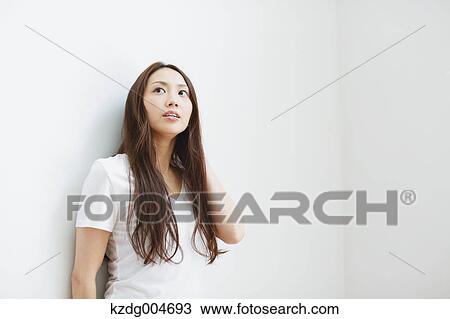 Stock Image - Young attractive Japanese woman portrait. Fotosearch