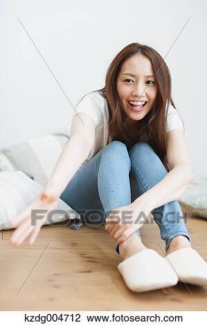 Stock Image - Young attractive Japanese woman portrait. Fotosearch