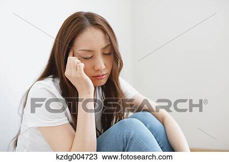 Stock Image - Young attractive Japanese woman portrait. Fotosearch