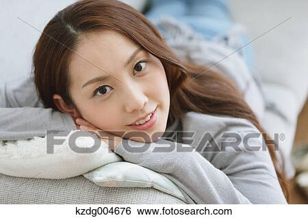 Stock Photograph - Young attractive Japanese woman portrait. Fotosearch