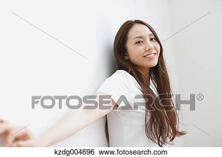 Stock Photograph - Young attractive Japanese woman portrait. Fotosearch