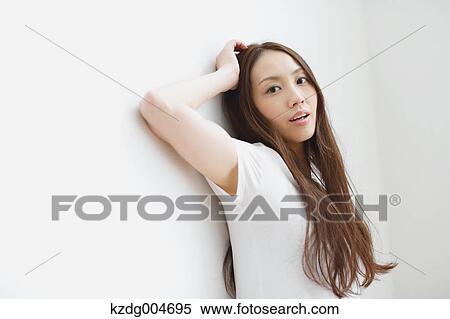 Stock Photography - Young attractive Japanese woman portrait. Fotosearch