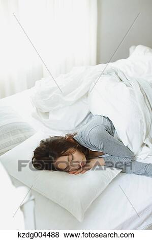 Young attractive Japanese woman sleeping in bed View Large Photo Image Stock Photo - Young attractive Japanese woman sleeping in bed. Fotosearch