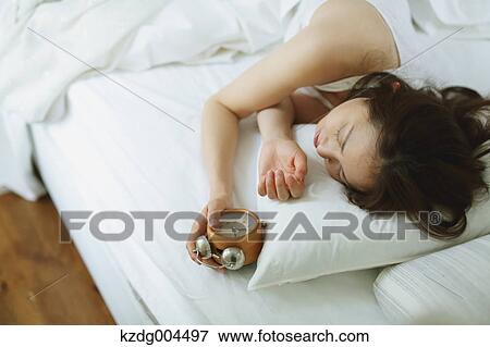 Young attractive Japanese woman sleeping in bed View Large Photo Image Stock Photo - Young attractive Japanese woman sleeping in bed. Fotosearch
