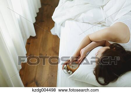 Young attractive Japanese woman sleeping in bed View Large Photo Image Stock Photo - Young attractive Japanese woman sleeping in bed. Fotosearch
