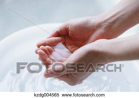 Young attractive Japanese woman washing face in the bathroom View Large Photo Image Stock Photography - Young attractive Japanese woman washing face in the bathroom. Fotosearch