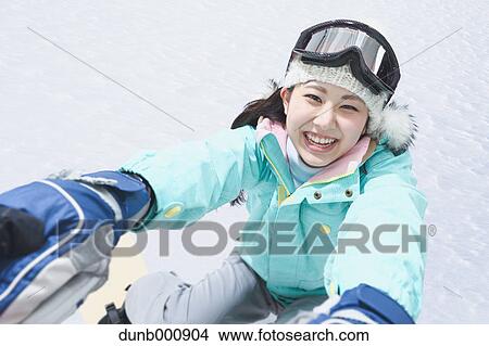 Young Japanese woman snowboarding View Large Photo Image Picture - Young Japanese woman snowboarding. Fotosearch