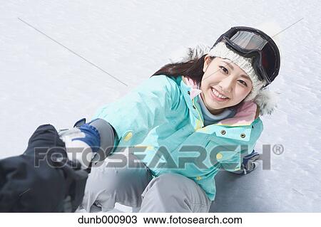 Young Japanese woman snowboarding View Large Photo Image Stock Image - Young Japanese woman snowboarding. Fotosearch