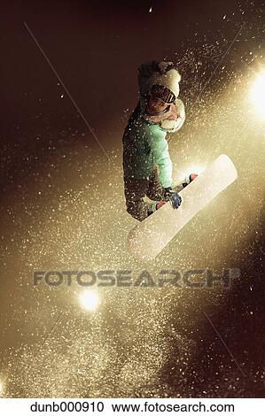 Young Japanese woman snowboarding View Large Photo Image Stock Image - Young Japanese woman snowboarding. Fotosearch