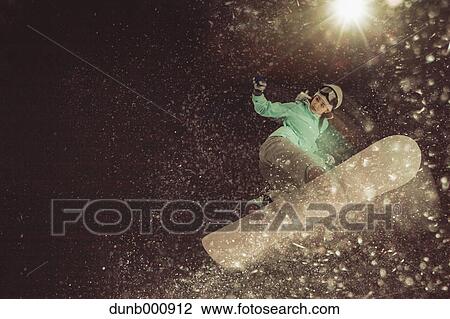 Young Japanese woman snowboarding View Large Photo Image Stock Image - Young Japanese woman snowboarding. Fotosearch