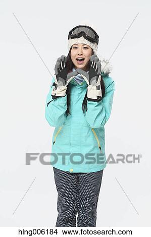 Young Japanese woman wearing snowboard wear on white background View Large Photo Image Picture - Young Japanese woman wearing snowboard wear on white background. Fotosearch