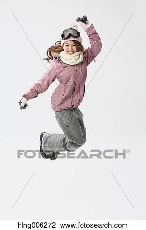 Young Japanese woman wearing snowboard wear on white background View Large Photo Image Stock Image - Young Japanese woman wearing snowboard wear on white background. Fotosearch
