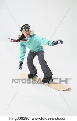 Young Japanese woman wearing snowboard wear on white background View Large Photo Image Stock Image - Young Japanese woman wearing snowboard wear on white background. Fotosearch