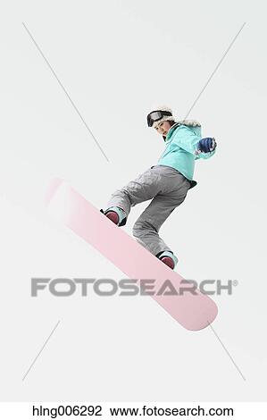 Young Japanese woman wearing snowboard wear on white background View Large Photo Image Stock Image - Young Japanese woman wearing snowboard wear on white background. Fotosearch