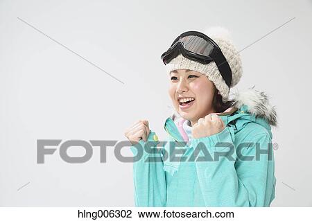 Young Japanese woman wearing snowboard wear on white background View Large Photo Image Stock Image - Young Japanese woman wearing snowboard wear on white background. Fotosearch