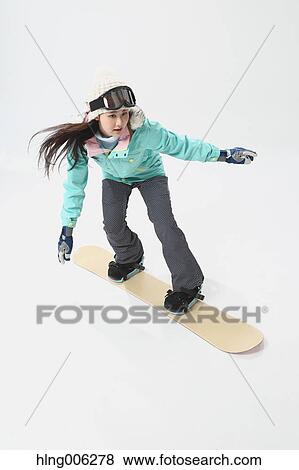 Young Japanese woman wearing snowboard wear on white background View Large Photo Image Stock Photo - Young Japanese woman wearing snowboard wear on white background. Fotosearch