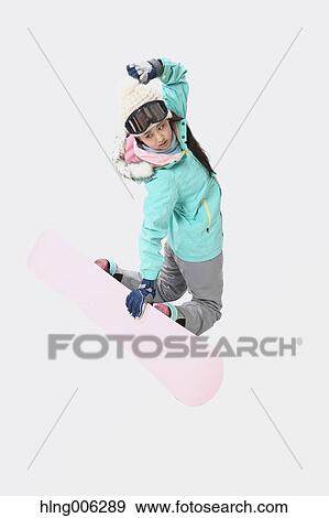 Young Japanese woman wearing snowboard wear on white background View Large Photo Image Stock Photo - Young Japanese woman wearing snowboard wear on white background. Fotosearch