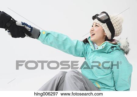 Young Japanese woman wearing snowboard wear on white background View Large Photo Image Stock Photo - Young Japanese woman wearing snowboard wear on white background. Fotosearch