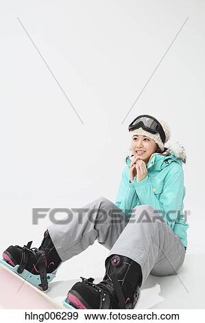 Young Japanese woman wearing snowboard wear on white background View Large Photo Image Stock Photo - Young Japanese woman wearing snowboard wear on white background. Fotosearch