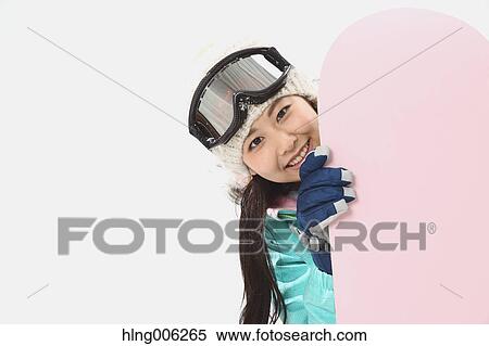 Young Japanese woman wearing snowboard wear on white background View Large Photo Image Stock Photography - Young Japanese woman wearing snowboard wear on white background. Fotosearch