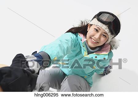 Young Japanese woman wearing snowboard wear on white background View Large Photo Image Stock Photography - Young Japanese woman wearing snowboard wear on white background. Fotosearch