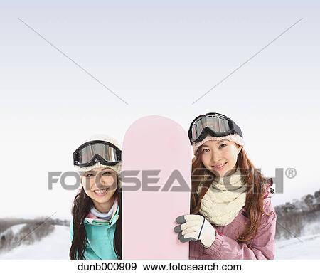 Young Japanese women snowboarding View Large Photo Image Stock Photo - Young Japanese women snowboarding. Fotosearch