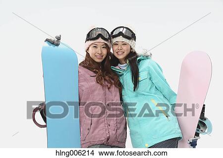 Young Japanese women wearing snowboard wear on white background View Large Photo Image Picture - Young Japanese women wearing snowboard wear on white background. Fotosearch