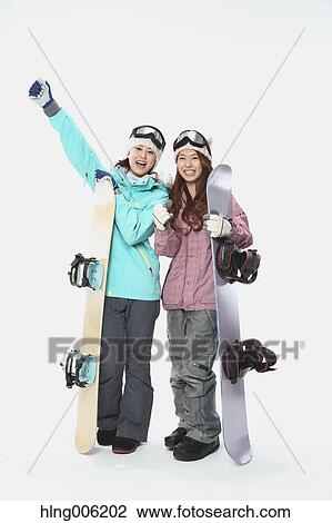 Young Japanese women wearing snowboard wear on white background View Large Photo Image Stock Image - Young Japanese women wearing snowboard wear on white background. Fotosearch