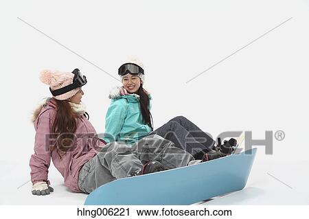 Young Japanese women wearing snowboard wear on white background View Large Photo Image Stock Image - Young Japanese women wearing snowboard wear on white background. Fotosearch