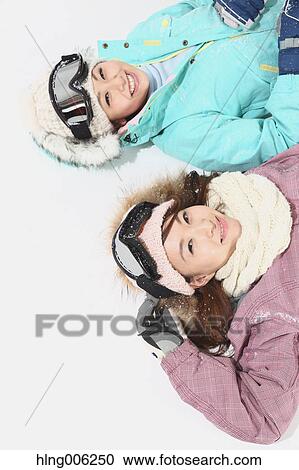 Young Japanese women wearing snowboard wear on white background View Large Photo Image Stock Image - Young Japanese women wearing snowboard wear on white background. Fotosearch