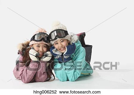 Young Japanese women wearing snowboard wear on white background View Large Photo Image Stock Image - Young Japanese women wearing snowboard wear on white background. Fotosearch