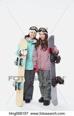 Young Japanese women wearing snowboard wear on white background View Large Photo Image Stock Photo - Young Japanese women wearing snowboard wear on white background. Fotosearch