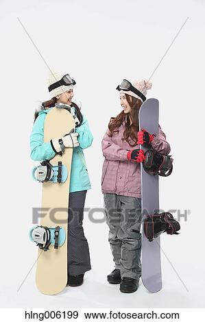 Young Japanese women wearing snowboard wear on white background View Large Photo Image Stock Photo - Young Japanese women wearing snowboard wear on white background. Fotosearch