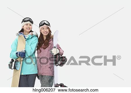 Young Japanese women wearing snowboard wear on white background View Large Photo Image Stock Photo - Young Japanese women wearing snowboard wear on white background. Fotosearch
