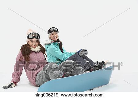 Young Japanese women wearing snowboard wear on white background View Large Photo Image Stock Photo - Young Japanese women wearing snowboard wear on white background. Fotosearch