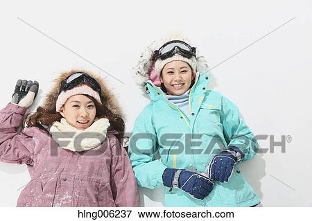 Young Japanese women wearing snowboard wear on white background View Large Photo Image Stock Photo - Young Japanese women wearing snowboard wear on white background. Fotosearch