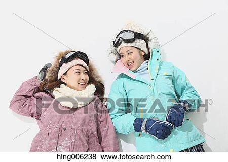 Young Japanese women wearing snowboard wear on white background View Large Photo Image Stock Photo - Young Japanese women wearing snowboard wear on white background. Fotosearch