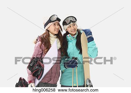Young Japanese women wearing snowboard wear on white background View Large Photo Image Stock Photo - Young Japanese women wearing snowboard wear on white background. Fotosearch