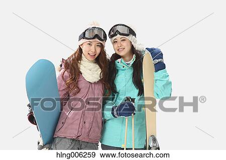 Young Japanese women wearing snowboard wear on white background View Large Photo Image Stock Photo - Young Japanese women wearing snowboard wear on white background. Fotosearch