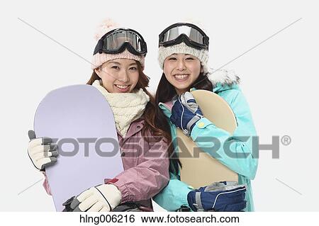 Young Japanese women wearing snowboard wear on white background View Large Photo Image Stock Photograph - Young Japanese women wearing snowboard wear on white background. Fotosearch