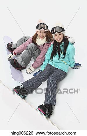 Young Japanese women wearing snowboard wear on white background View Large Photo Image Stock Photograph - Young Japanese women wearing snowboard wear on white background. Fotosearch