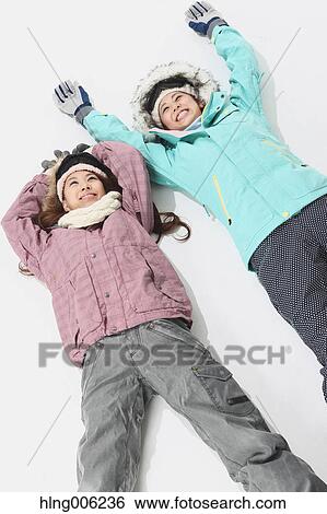 Young Japanese women wearing snowboard wear on white background View Large Photo Image Stock Photograph - Young Japanese women wearing snowboard wear on white background. Fotosearch