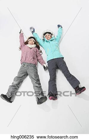Young Japanese women wearing snowboard wear on white background View Large Photo Image Stock Photography - Young Japanese women wearing snowboard wear on white background. Fotosearch