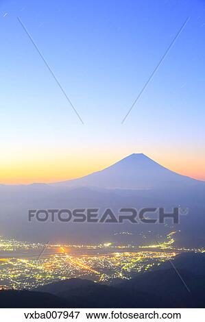 Stock Photo - Beautiful view of Mount Fuji and Fujikawa town, Yamanashi Prefecture, Japan. Fotosearch