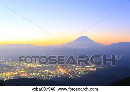 Stock Photo - Beautiful view of Mount Fuji and Fujikawa town, Yamanashi Prefecture, Japan. Fotosearch