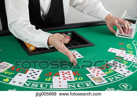 Black Jack dealer at casino View Large Photo Image Stock Photo - Black Jack dealer at casino. Fotosearch